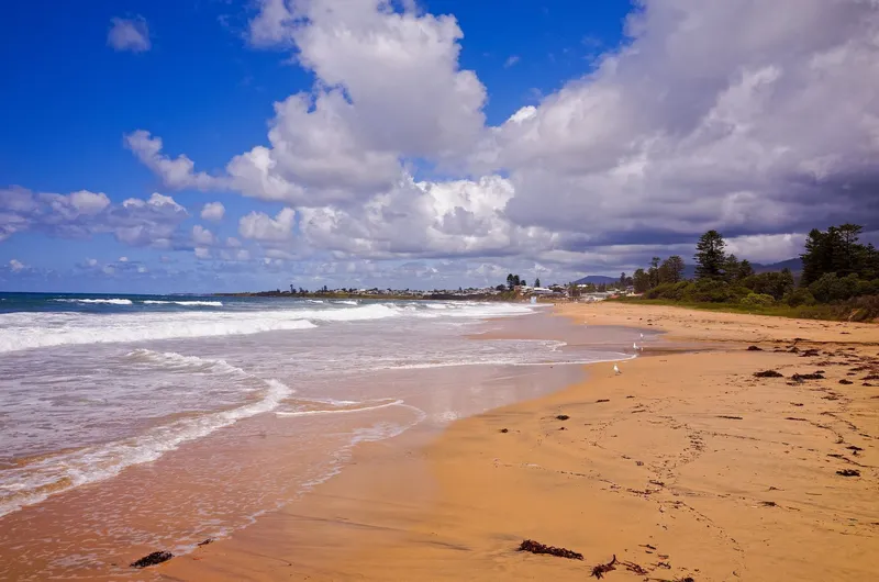 Sandy Thirroul beach with ocean waves