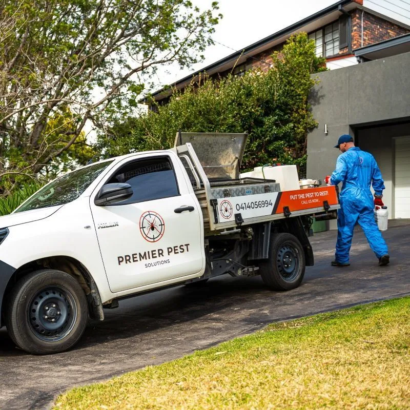 Premier Pest Control technician on a commercial job